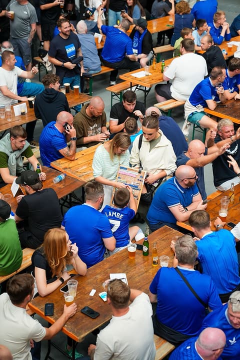 Communal tables full of Everton fans at Ten Streets Social